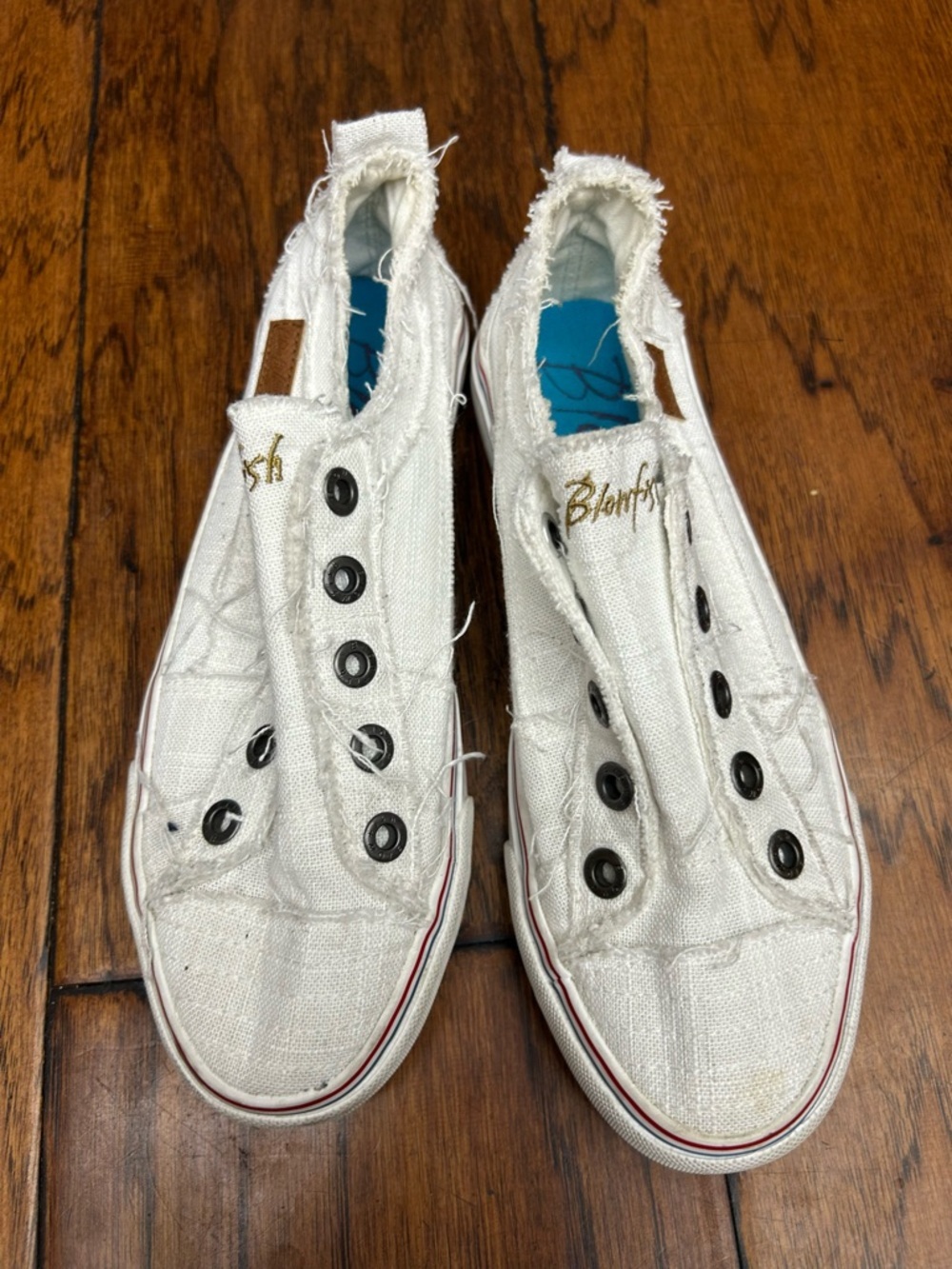 Blowfish White Frayed Canvas Slip-Ons with Black Eyelets